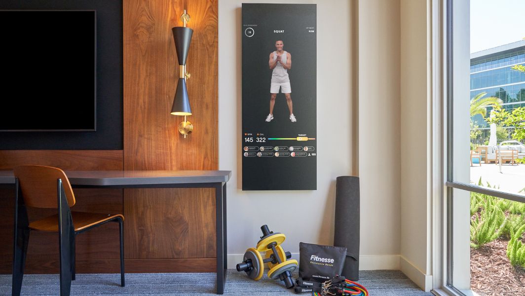 The in-room Mirror and exercise equipment at the Ameswell Hotel