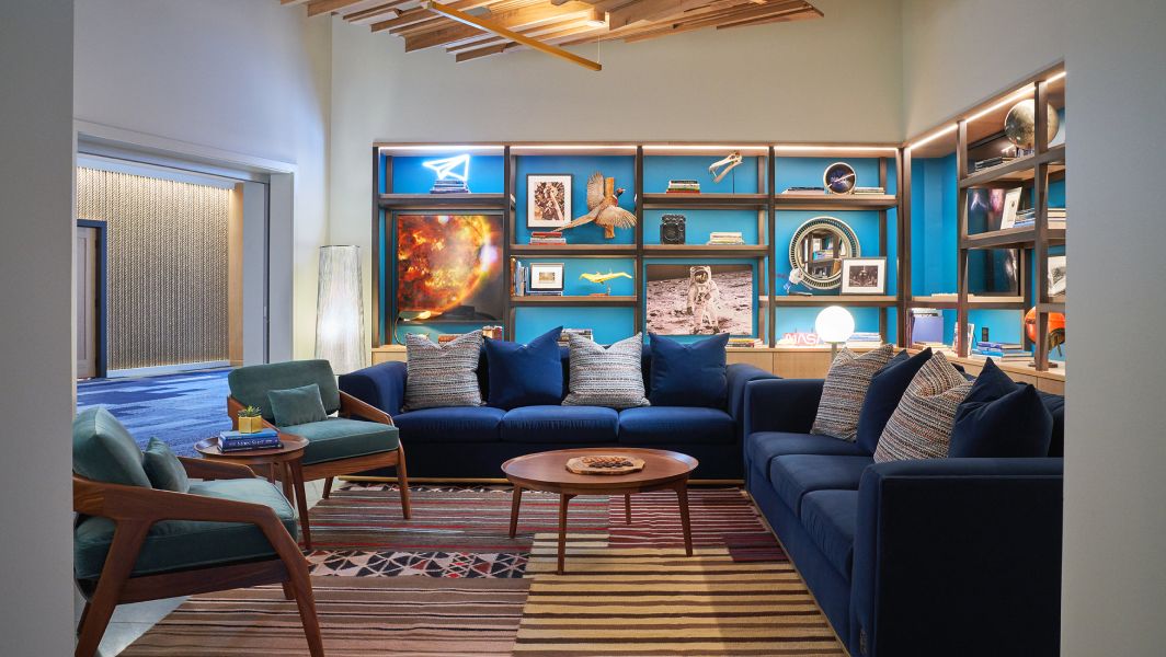 Couches and chairs decorate a lounge area at the Ameswell Hotel
